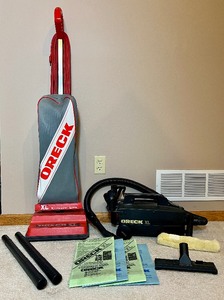 lot 77 image: Oreck Vacuum Bundle