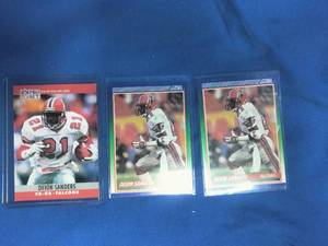 lot 57 image: 3 Deion Sanders Cards