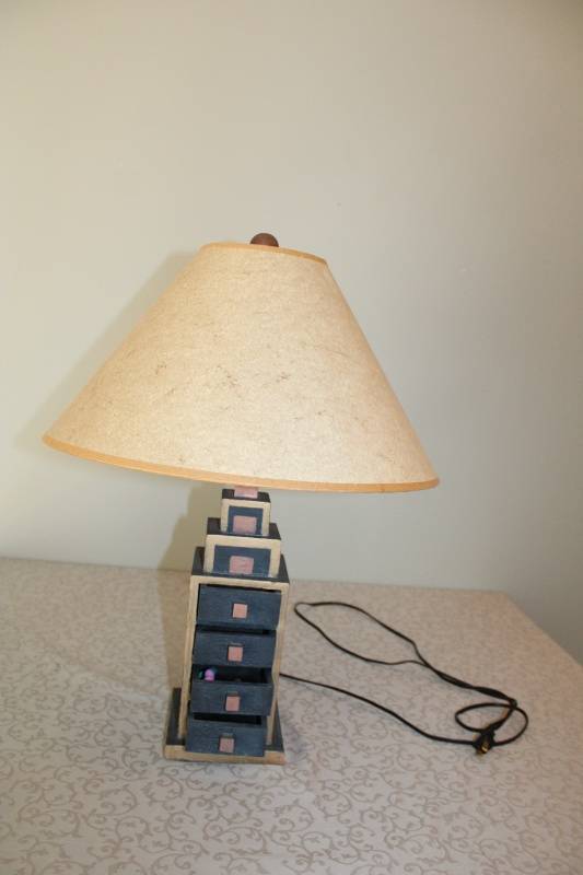 lot 26 image: Table Lamp with Decorative Multi-Drawer Base