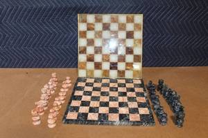 lot 422 image: Set of 2 Stone Chess Boards with Carved Game Pieces