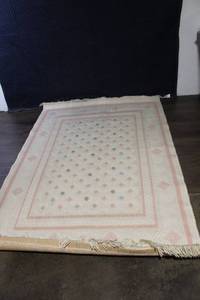 lot 428 image: Pastel Woven Area Rug with Geometric Pattern 52x80 Inches