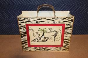 lot 394 image: Decorative Metal Magazine Holder with Zebra Shoe Artwork