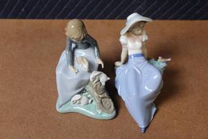 lot 395 image: Pair of Porcelain Figurines Young Lady with Rabbits and Lady with Bird