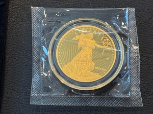 lot 43 image: Cook Island .999 Fine Gold $5 Dollar St. Gaudens Coin