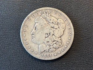 lot 47 image: 1884-O Morgan Dollar