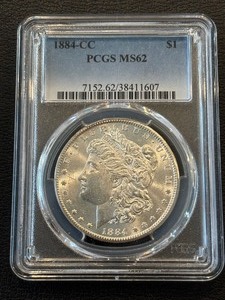 lot 103 image: 1884-CC Morgan Dollar PCGS MS62