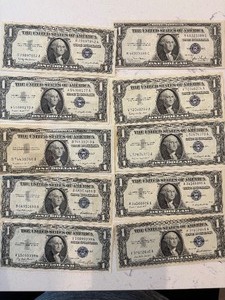 lot 148 image: Blue Seal $1 Dollar Silver Certificates