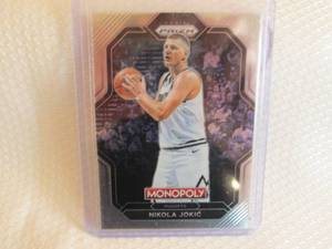 lot 31 image: 2022-23 Prizm Monopoly Nikola Jokic...