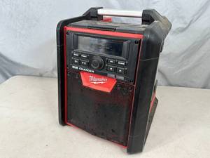lot 12 image: Milwaukee M18 18-Volt Radio and Charger