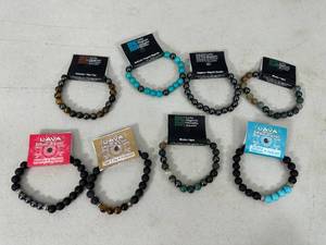 lot 69 image: 8 New Lava, Magnetic Bracelets