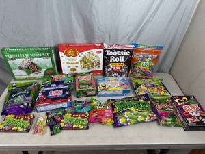 lot 97 image: Assorted Candy, Halloween Candy, Gummy Bands, Wicked Movie Candy, Tootsie Rolls, Fruit Chews, and More