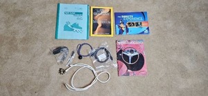 lot 61 image: Collection of Cables, Connectors, and Assorted Booklets