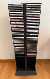 lot 117 image: Collection of Jazz and Rock CDs with Black Vertical CD Rack