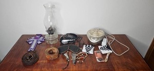 lot 138 image: Mixed Collectibles Lot Oil Lamp, Craft Cross, Belts, Cords, Headphones, and Accessories