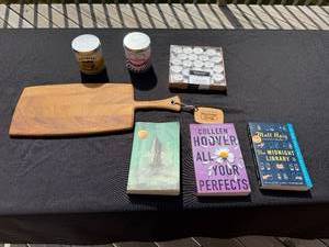 lot 186 image: Lot of Novels, Candles, and Ironwood Gourmet Cheese Board