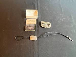 lot 208 image: Group of Vintage Belt Buckles and Western Bolo Tie