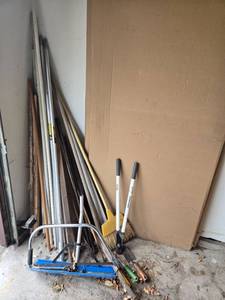 lot 315 image: Garage Cleaning Tools and Handles Collection