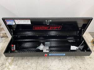 lot 27 image: Weather Guard 56 in. Gloss Black Aluminum Lo-Side Truck Tool Box (see pictures)