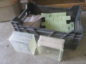 lot 40 image: (EC1) Assorted Tile and 2 Glass Blo...
