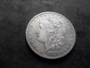 lot 17 image: 1882 CC Morgan Silver Dollar