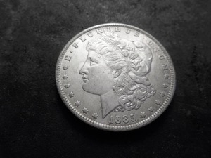 lot 30 image: 1885 O Morgan Silver Dollar