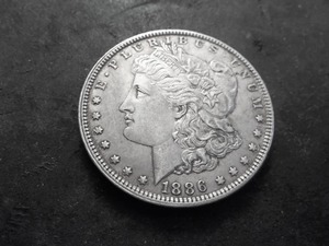 lot 32 image: 1886 Morgan Silver Dollar
