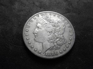 lot 34 image: 1886 S Morgan Silver Dollar