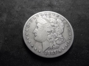 lot 37 image: 1887 S Morgan Silver Dollar
