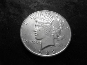 lot 49 image: 1928 S Peace Silver Dollar