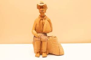 lot 8 image: Vintage Hand Carved Wooden Peasant