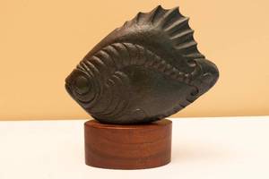 lot 100 image: Stone Carved Fish on Wood Pedestal.  Limited Edition