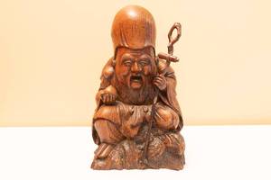 lot 102 image: Carved Wood Lucky God
