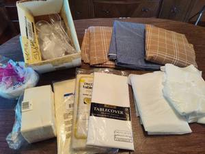 lot 128 image: Lot of ReusableDisposable Tablecloths & Cutlery