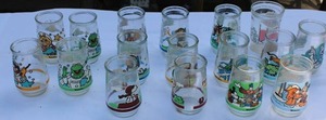 lot 22 image: Lot of 17 Vintage Jelly Glasses  Muppets, Disney, Peanuts & Looney Tunes (Mid-1990s)