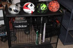 lot 57 image: Sport Rack, Garage Organizer  Baseball Soccer Basketball, Football etc