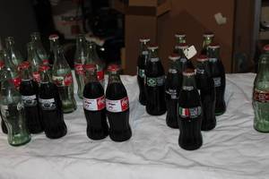 lot 115 image: Lot of Commemorative 8 oz Coca-Cola Bottles  University of Minnesota, Super Bowl XXVI, World Cup 1994 & More