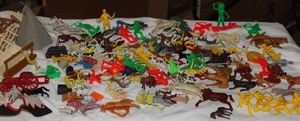 lot 121 image: Large Collection of Vintage Plastic Cowboy & Indian Figures  Includes Horses, Teepee, Wagon, Fences & More