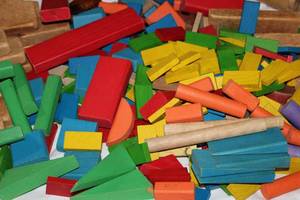 lot 124 image: Large Collection of Wooden Building Blocks  Assorted Shapes Including Rectangles, Triangles, Pillars & More