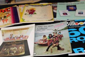 lot 132 image: Collection of 10 Music Books Inc Three Dog Night, Crosby Stills Nash and Young, Titanic, Disney, Billboard 60s rock and more