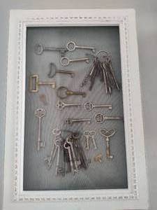 lot 34 image: Shadow Box Filled with Skeleton Keys