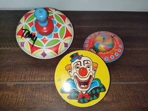 lot 134 image: Three VIntage TopsToys