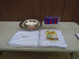 lot 102 image: Stainless bowl with towels & cleaning cloth. As shown.