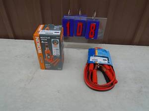 lot 108 image: New Workin 4 ton bottle jack & booster cables. As shown.