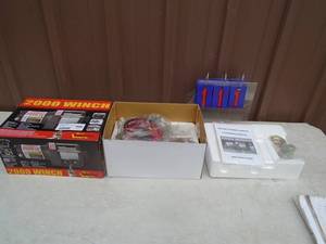 New 2000 lb ATV/Trailer winch with controller. As shown.