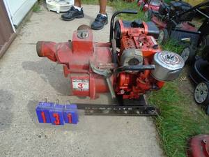 lot 131 image: Homelite 3 gas trash pump. Cast iron with spare housing. Tested & works. As shown.