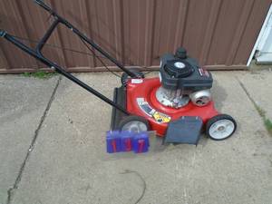 lot 137 image: Yard Machine 21 push mower. Good condition. Tested & works. As shown.