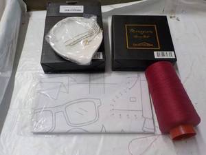 lot 111 image: Spoon Rest, Yarn, and Tablecloth...