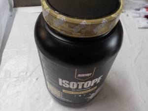 lot 125 image: Isotope 31.85 oz Protein Powder Dri...
