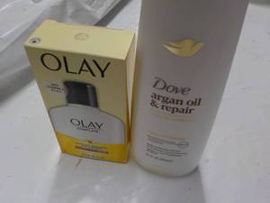 lot 204 image: Olay Moisturizer and Dove Argan Oil...