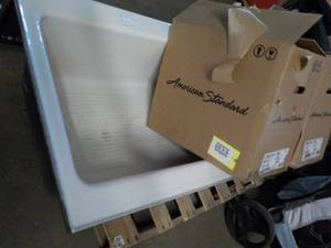 lot 255 image: Cast Iron Bath Tub and 2 Sinks...